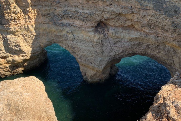 a view of a cliff near a body of water